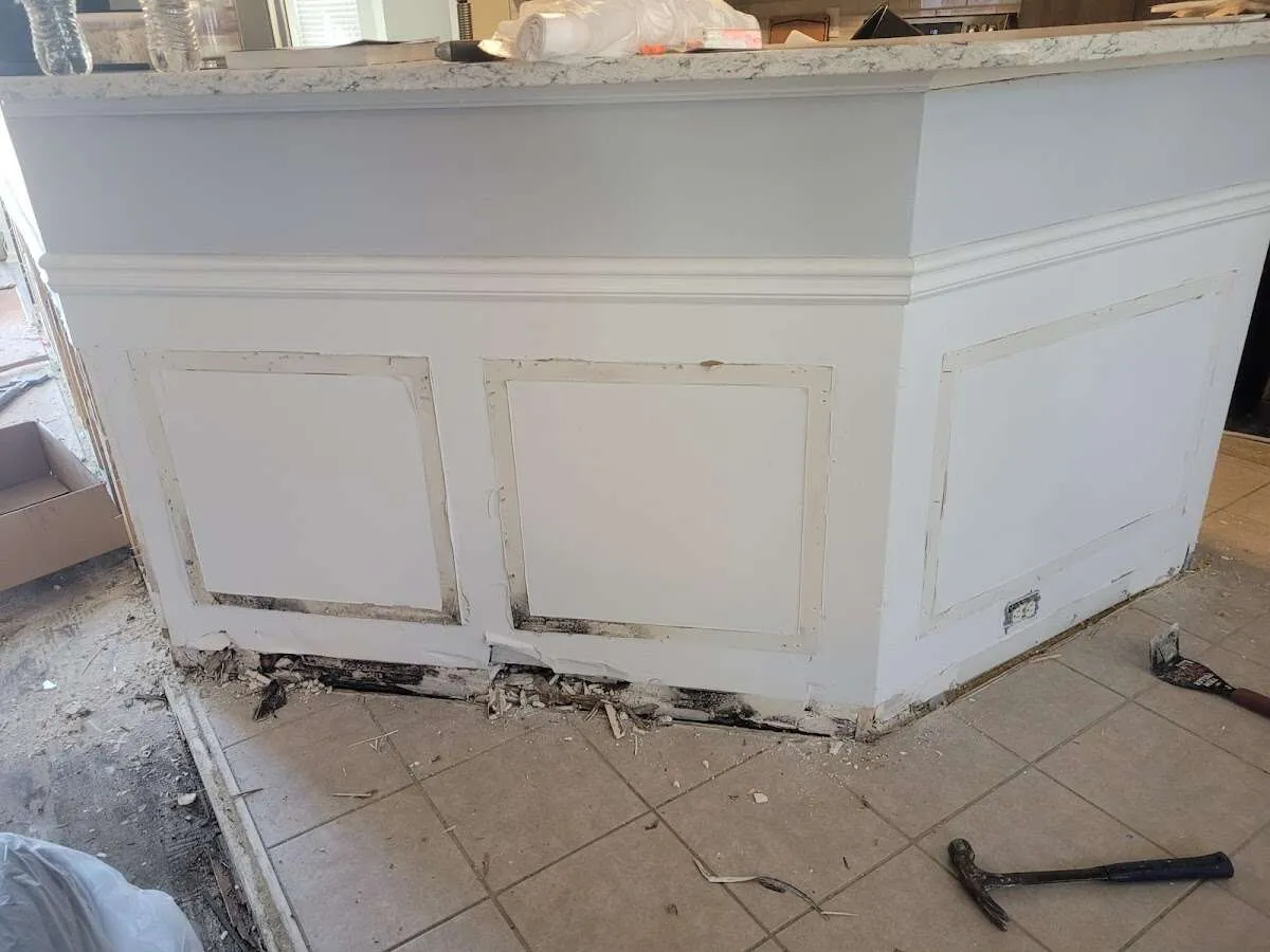 Water damage and mold on kitchen during Storm Damage Restoration in Yankton